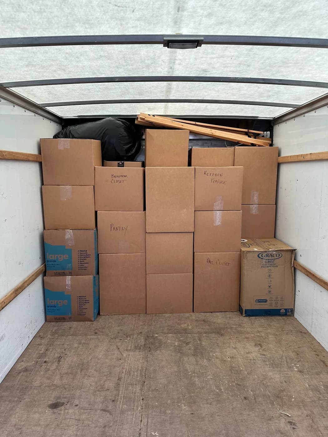 Labeled boxes stacked in a truck