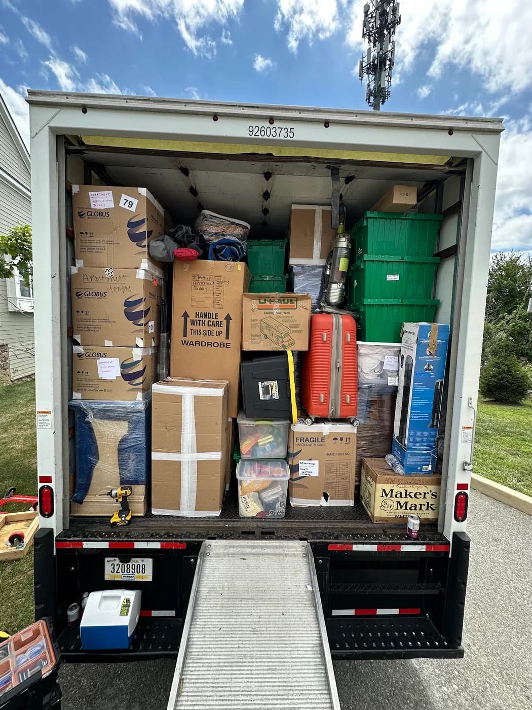 A loaded truck seen from the rear