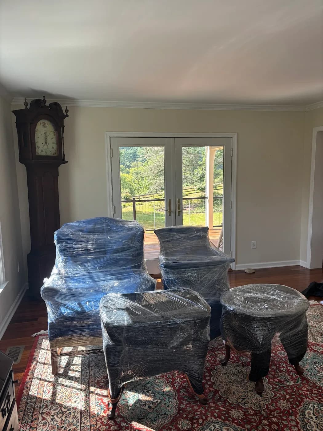Furniture wrapped and padded in a living room